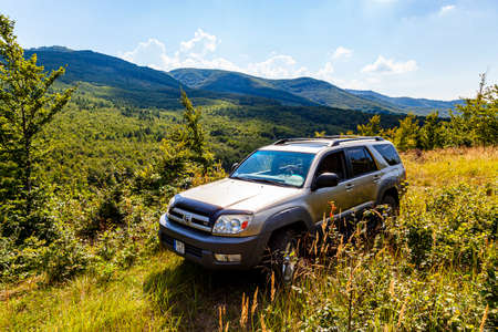 Hungary Matra mountain region Aug, 10, 2020: Toyota 4Runner SUV touring along on the forestry...