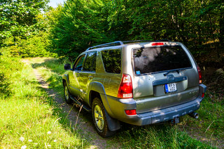 Hungary Matra mountain region Aug, 10, 2020: Toyota 4Runner SUV touring along on the forestry...
