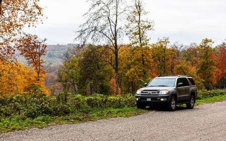 Hungary BÃ¶rzsÃ¶ny Mountain Range Nov 1 2020: Toyota 4runner 4x4 SUV on forestry road at autumn...
