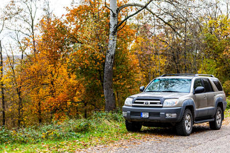 Hungary BÃ¶rzsÃ¶ny Mountain Range Nov 1 2020: Toyota 4runner 4x4 SUV on forestry road at autumn in mountains. Mountain trail landscape. Adventure travel. BÃ¶rzsÃ¶ny mountains, gorges and mountain pass.のeditorial素材