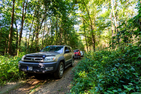 Hungary Matra mountain range Sept. 6, 2020: Different 4 wheel drive vehicles are on a off-road trip on the forestry tracks.のeditorial素材