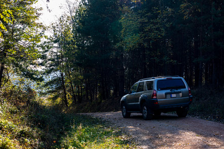 Hungary Central Mountain Range Sept. 23, 2020: Toyota 4Runner SUV touring along on the forestry...