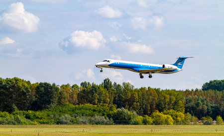 Budapest Hungary July 24 2019: Ukraine International  Embraer just landing at Budapest International...