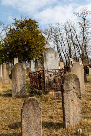 Lovasbereny Hungary Mar 2 2019: Jewish headstones in a ancient Jewish graveyard - dating back to the 1700'sのeditorial素材