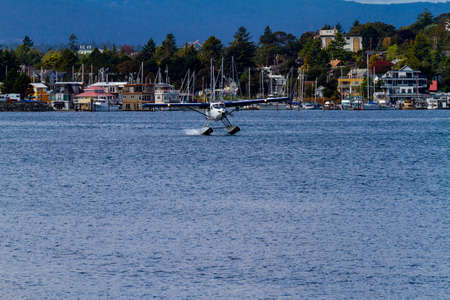 Victoria, BC, Canada - July 22 2019:  Float-plane in the inner harbor. This transportation is vital and very frequent between Vitoria and Vancouver, also the flight is very pictures.のeditorial素材