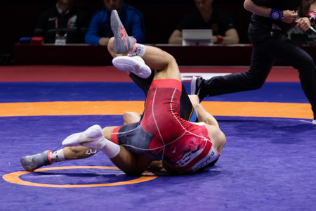 Budapest Hungary - Apr. 3, 2022: Akbudak B- TUR - Eisele P. GER compete in the E.U. Man Wrestling Championship Budapest Hungaryのeditorial素材