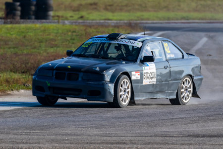 Kakucs Hungary - October 15th 2022: European Rallycross championship modified rally car driving on slalom course at the international rally event.のeditorial素材