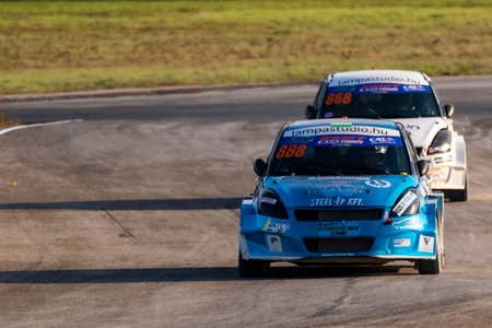 Kakucs Hungary - October 15th 2022: European Rallycross championship modified rally car driving on slalom course at the international rally event.のeditorial素材
