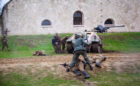 Komarom Hungary fort of Monostor Oct. 2 22: Reenactors World War II German Wehrmacht, SS Soldiers Fighting with invading Soviet red army forces. Free public event.のeditorial素材