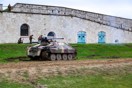 Komarom Hungary fort of Monostor Oct. 2 22: Reenactors World War II German Wehrmacht, SS Soldiers Fighting with invading Soviet red army forces. Free public event.のeditorial素材