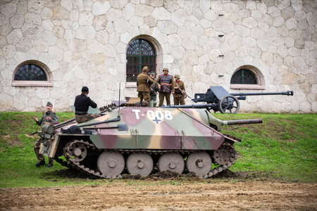 Komarom Hungary fort of Monostor Oct. 2 22: Reenactors World War II German Wehrmacht, SS Soldiers Fighting with invading Soviet red army forces. Free public event.のeditorial素材