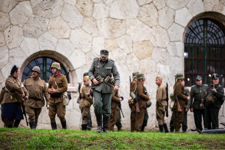 Komarom Hungary fort of Monostor Oct. 2 22: Reenactors World War II German Wehrmacht, SS Soldiers Fighting with invading Soviet red army forces. Free public event.のeditorial素材
