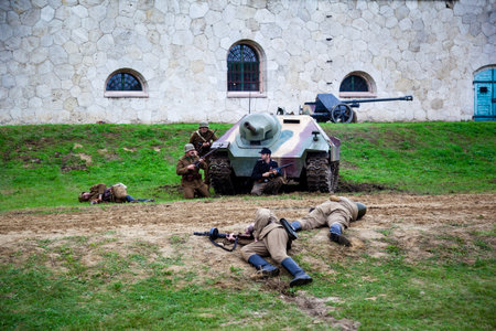 Komarom Hungary fort of Monostor Oct. 2 22: Reenactors World War II German Wehrmacht, SS Soldiers Fighting with invading Soviet red army forces. Free public event.のeditorial素材