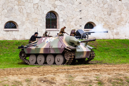 Komarom Hungary fort of Monostor Oct. 2 22: Reenactors World War II German Wehrmacht, SS Soldiers Fighting with invading Soviet red army forces. Free public event.のeditorial素材