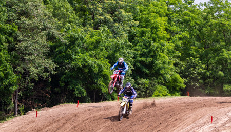 Tapiobicske Hungary - June 11, 23 :  Unidentified racers in MX2  MX2 race during the open, Motocross Championship.のeditorial素材