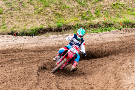 Tapiobicske Hungary - June 11, 23 :  Unidentified racers in MX2  MX2 race during the open, Motocross Championship.のeditorial素材