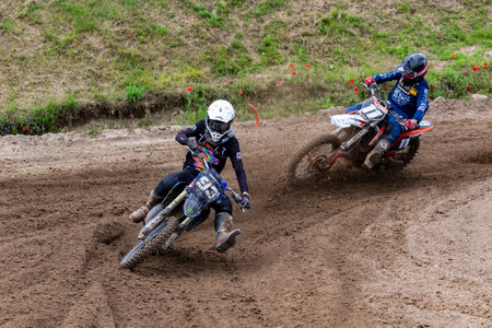 Tapiobicske Hungary - June 11, 23 :  Unidentified racers in MX2  MX2 race during the open, Motocross Championship.のeditorial素材