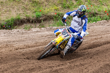 Tapiobicske Hungary - June 11, 23 :  Unidentified racers in MX2  MX2 race during the open, Motocross Championship.のeditorial素材
