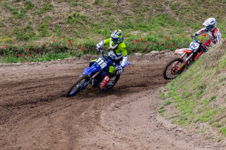 Tapiobicske Hungary - June 11, 23 :  Unidentified racers in MX2  MX2 race during the open, Motocross Championship.のeditorial素材