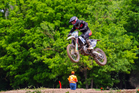 Tapiobicske Hungary - June 11, 23 :  Unidentified racers in MX2  MX2 race during the open, Motocross Championship.のeditorial素材