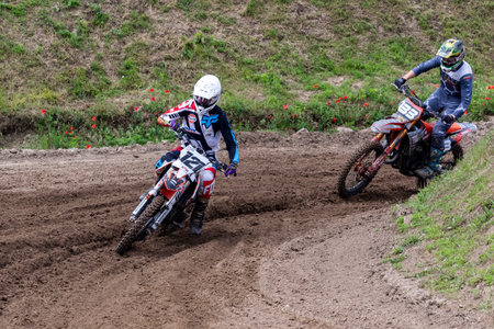 Tapiobicske Hungary - June 11, 23 :  Unidentified racers in MX2  MX2 race during the open, Motocross Championship.のeditorial素材