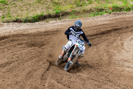 Tapiobicske Hungary - June 11, 23 :  Unidentified racers in MX2  MX2 race during the open, Motocross Championship.のeditorial素材