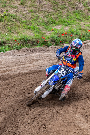 Tapiobicske Hungary - June 11, 23 :  Unidentified racers in MX2  MX2 race during the open, Motocross Championship.のeditorial素材