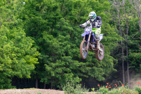 Tapiobicske Hungary - June 11, 23 :  Unidentified racers in MX2  MX2 race during the open, Motocross Championship.のeditorial素材