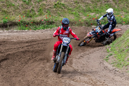 Tapiobicske Hungary - June 11, 23 :  Unidentified racers in MX2  MX2 race during the open, Motocross Championship.のeditorial素材