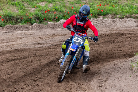 Tapiobicske Hungary - June 11, 23 :  Unidentified racers in MX2  MX2 race during the open, Motocross Championship.のeditorial素材