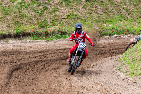 Tapiobicske Hungary - June 11, 23 :  Unidentified racers in MX2  MX2 race during the open, Motocross Championship.のeditorial素材