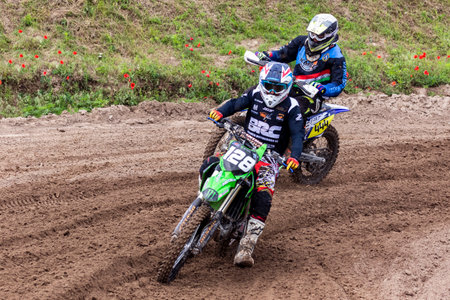 Tapiobicske Hungary - June 11, 23 :  Unidentified racers in MX2  MX2 race during the open, Motocross Championship.のeditorial素材