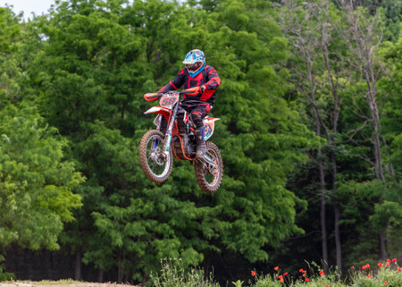 Tapiobicske Hungary - June 11, 23 :  Unidentified racers in MX2  MX2 race during the open, Motocross Championship.のeditorial素材
