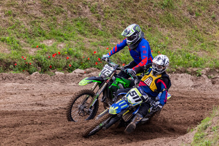 Tapiobicske Hungary - June 11, 23 :  Unidentified racers in MX2  MX2 race during the open, Motocross Championship.のeditorial素材