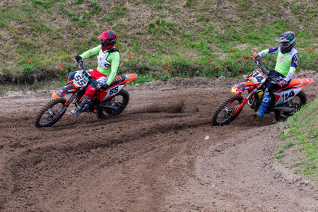 Tapiobicske Hungary - June 11, 23 :  Unidentified racers in MX2  MX2 race during the open, Motocross Championship.のeditorial素材