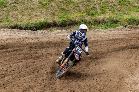 Tapiobicske Hungary - June 11, 23 :  Unidentified racers in MX2  MX2 race during the open, Motocross Championship.のeditorial素材