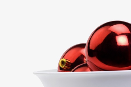 Close-up of red baubles in a bowlの写真素材