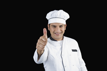Portrait of a chef gesturing thumbs up signの写真素材