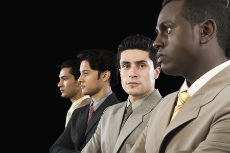 Portrait of a businessman standing with his colleaguesの写真素材