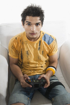 Portrait of a man playing a video game