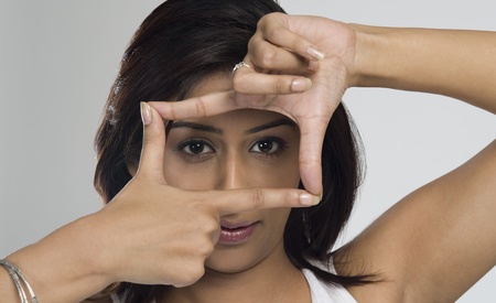 Woman making a finger frame
