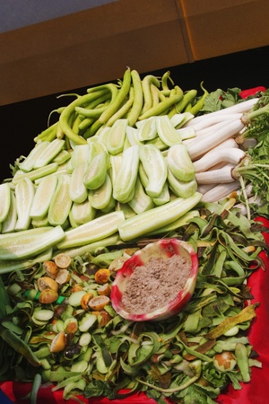 Cucumber and radish at a market stall, New Delhi, Indiaの写真素材