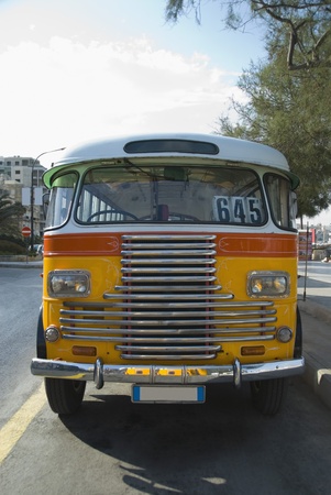 Bus on the road, Valletta, Maltaの写真素材