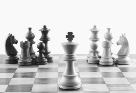 Close-up of chess pieces on a chessboard
