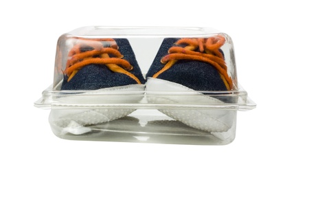 Close-up of a pair canvas shoes in a boxの写真素材