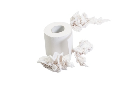 Close-up of a toilet paper roll with crumpled papersの写真素材