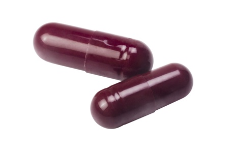 Close-up of two capsules