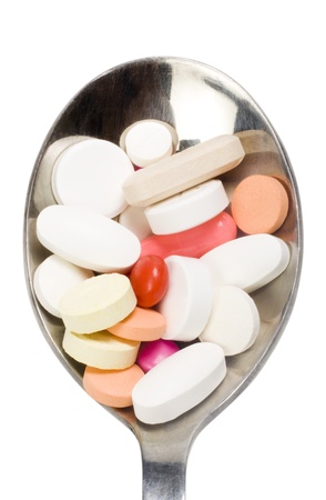 Close-up of a spoon full of medicinesの写真素材