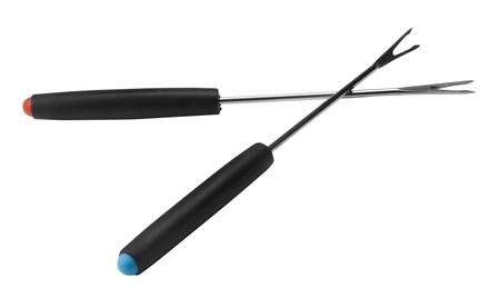 Close-up of two fondue forksの写真素材