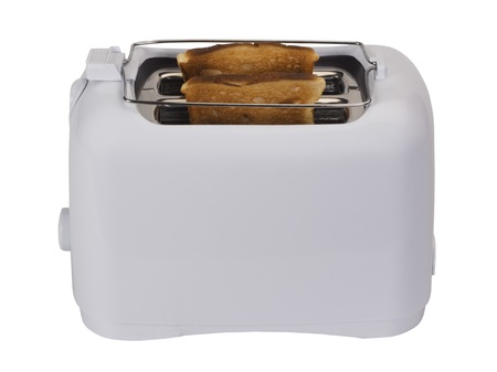 Close-up of a toaster with toasts